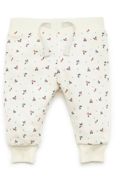 Aanbieding van Crèmekleurige joggingbroek met print voor baby's (meisje) voor 4€ bij Primark